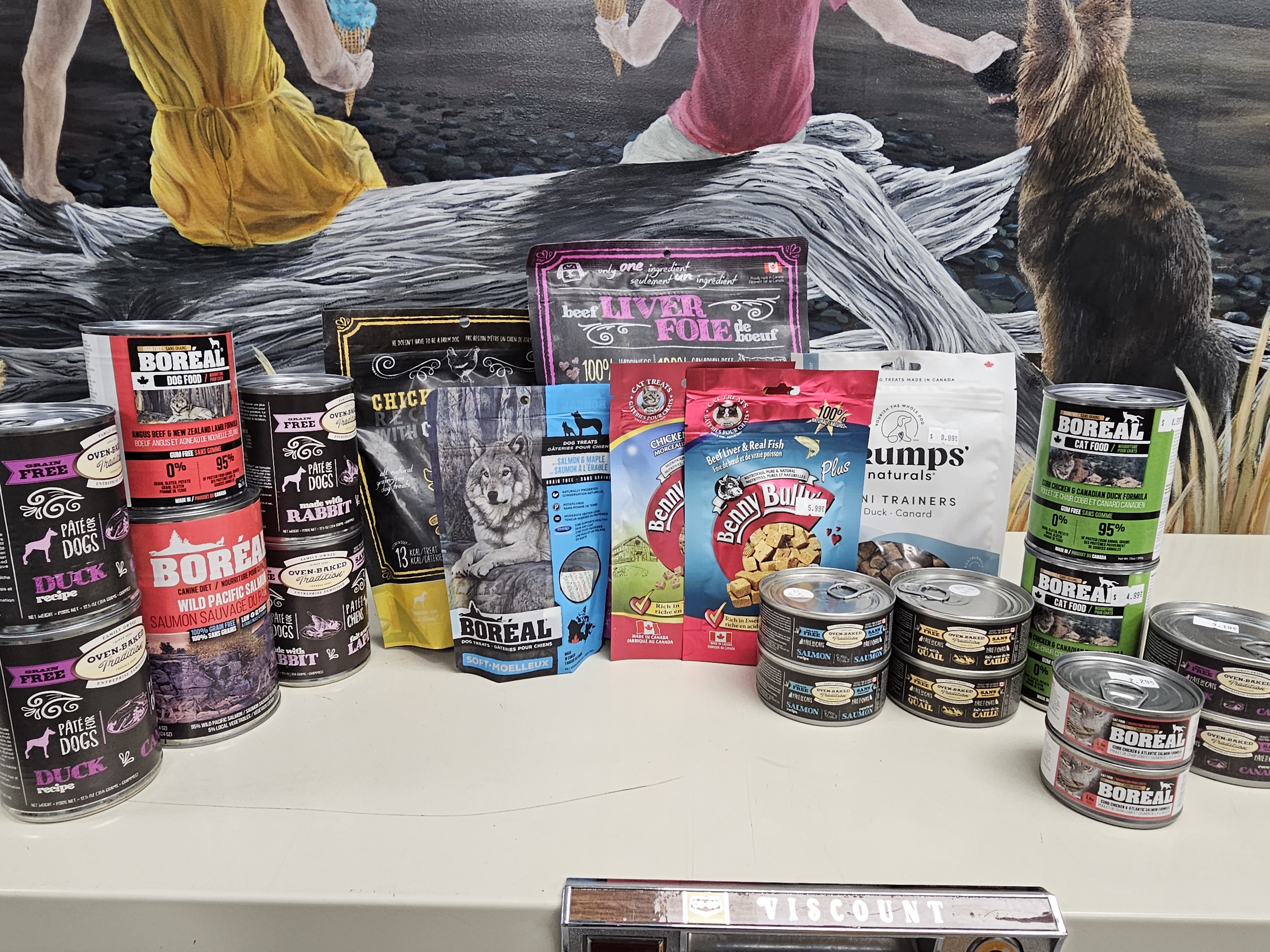 Boreal pet food products neatly arranged on store shelves
